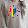 Rainbow Book With Stars And Moon Phases Gay Pride LGBT Raglan Sleeve Sweatshirt Heather Forest Rainbow Book With Stars And Moon Phases Gay Pride LGBT Raglan Sleeve Sweatshirt Heather Forest