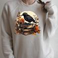 Raven Reading Book Occult Crow Raglan Sleeve Sweatshirt Heather Forest