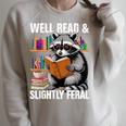 Well Read & Slightly Feral Raccoon Book Lover Graphic Raglan Sleeve Sweatshirt Heather Forest Well Read & Slightly Feral Raccoon Book Lover Graphic Raglan Sleeve Sweatshirt Heather Forest