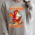 Read Be A Book Dragon Bookworm Raglan Sleeve Sweatshirt Heather Forest