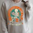 Read Books Be Kind Stay Weird Skeleton Reading Goth Bookish Premium Raglan Sleeve Sweatshirt Heather Forest Read Books Be Kind Stay Weird Skeleton Reading Goth Bookish Premium Raglan Sleeve Sweatshirt Heather Forest