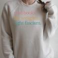 Read Books Lift Weights Fight Fascism Raglan Sleeve Sweatshirt Heather Forest