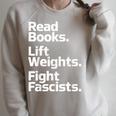 Read Books Lift Weights Fight Fascists Bookish Quote Raglan Sleeve Sweatshirt Heather Forest