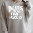 Read Books Lift Weights Fight Fascists Gym Reader Book Raglan Sleeve Sweatshirt Heather Forest