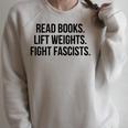 Read Books Lift Weights Fight Fascists Premium Tri-Blend Raglan Sleeve Sweatshirt Heather Forest Read Books Lift Weights Fight Fascists Premium Tri-Blend Raglan Sleeve Sweatshirt Heather Forest