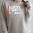 Read Books Lift Weights Fight Fascists Real Life Fulfillment Premium Tri-Blend Raglan Sleeve Sweatshirt Heather Forest Read Books Lift Weights Fight Fascists Real Life Fulfillment Premium Tri-Blend Raglan Sleeve Sweatshirt Heather Forest
