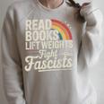 Read Books Lift Weights Fight Fascists Retro Vintage Raglan Sleeve Sweatshirt Heather Forest Read Books Lift Weights Fight Fascists Retro Vintage Raglan Sleeve Sweatshirt Heather Forest