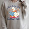 I Still Read Children’s Books Cute Duck Reading Book Lover Raglan Sleeve Sweatshirt Heather Forest