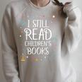 I Still Read Childrens Books For Kindergarten Teacher Raglan Sleeve Sweatshirt Heather Forest I Still Read Childrens Books For Kindergarten Teacher Raglan Sleeve Sweatshirt Heather Forest