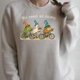 We Read At Dawn Book Lover Frog Duck Cycling Bookish Raglan Sleeve Sweatshirt Heather Forest