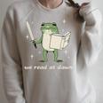 We Read At Dawn Vintage Frog Reading Book Frog Meme Raglan Sleeve Sweatshirt Heather Forest We Read At Dawn Vintage Frog Reading Book Frog Meme Raglan Sleeve Sweatshirt Heather Forest