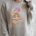 Read Return Repeat Book Lover Cat Reading Library Premium Tri-Blend Raglan Sleeve Sweatshirt Heather Forest