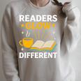 Readers Glow Different Book Lover Reading Premium Tri-Blend Raglan Sleeve Sweatshirt Heather Forest