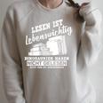 Reading Books Is Life Important Dinosaur Book Raglan Sleeve Sweatshirt Heather Forest