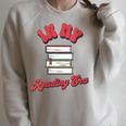 In My Reading Era Book Lover Librarian Author Bookish Reader Raglan Sleeve Sweatshirt Heather Forest In My Reading Era Book Lover Librarian Author Bookish Reader Raglan Sleeve Sweatshirt Heather Forest