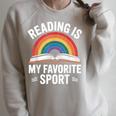Reading Is My Favorite Sport Book Lover Saying Rainbow Raglan Sleeve Sweatshirt Heather Forest