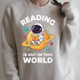 Reading Is Out Of This World Astronaut Book Lover Raglan Sleeve Sweatshirt Heather Forest