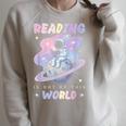 Reading Is Out Of This World Astronaut Space Book Lover Raglan Sleeve Sweatshirt Heather Forest
