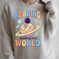 Reading Out Of The World Book Lover Reading Boys Girls Kids Raglan Sleeve Sweatshirt Heather Forest