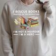 I Rescue Books Trapped In The Bookstore I'm Not A Hoarder Raglan Sleeve Sweatshirt Heather Forest I Rescue Books Trapped In The Bookstore I'm Not A Hoarder Raglan Sleeve Sweatshirt Heather Forest