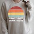 Retro Book Vibes Rainbow For Reading Lovers Vintage Raglan Sleeve Sweatshirt Heather Forest Retro Book Vibes Rainbow For Reading Lovers Vintage Raglan Sleeve Sweatshirt Heather Forest