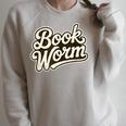 Retro Book Worm Reading For Book Lovers Raglan Sleeve Sweatshirt Heather Forest Retro Book Worm Reading For Book Lovers Raglan Sleeve Sweatshirt Heather Forest