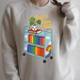 This Is How I Roll Rainbow Book Cart Queer Bookish Raglan Sleeve Sweatshirt Heather Forest This Is How I Roll Rainbow Book Cart Queer Bookish Raglan Sleeve Sweatshirt Heather Forest