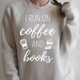 I Run On Coffee And Books Cool Quote For Bookworms Raglan Sleeve Sweatshirt Heather Forest I Run On Coffee And Books Cool Quote For Bookworms Raglan Sleeve Sweatshirt Heather Forest