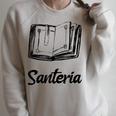 Santeria Bruja Book Raglan Sleeve Sweatshirt Heather Forest
