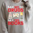 Say No To Drugs Say Yes To Books Red Ribbon Week Awareness Raglan Sleeve Sweatshirt Heather Forest