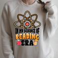 In My Science Of Reading Era Book Lover Reading Teacher Raglan Sleeve Sweatshirt Heather Forest