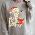 Skeleton Reading Book Christmas Teacher Librarian Book Lover Raglan Sleeve Sweatshirt Heather Forest Skeleton Reading Book Christmas Teacher Librarian Book Lover Raglan Sleeve Sweatshirt Heather Forest