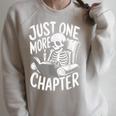 Skeleton Reading Book Halloween Just One More Chapter Raglan Sleeve Sweatshirt Heather Forest Skeleton Reading Book Halloween Just One More Chapter Raglan Sleeve Sweatshirt Heather Forest