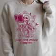 Skeleton Reading Book Just One More Chapter Raglan Sleeve Sweatshirt Heather Forest Skeleton Reading Book Just One More Chapter Raglan Sleeve Sweatshirt Heather Forest