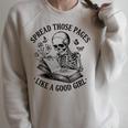 Spread Those Pages Like A Good Girl Skeleton Floral Book Raglan Sleeve Sweatshirt Heather Forest Spread Those Pages Like A Good Girl Skeleton Floral Book Raglan Sleeve Sweatshirt Heather Forest