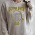 Star Wars The Book Of Boba Fett Vintage Helmet Logo Raglan Sleeve Sweatshirt Heather Forest Star Wars The Book Of Boba Fett Vintage Helmet Logo Raglan Sleeve Sweatshirt Heather Forest