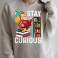 Stay Curious Monkey Reading Book Lover Bookworm Raglan Sleeve Sweatshirt Heather Forest