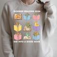 Summer Reading 2026 Unearth A Story Dinosaur Books Readers Raglan Sleeve Sweatshirt Heather Forest Summer Reading 2026 Unearth A Story Dinosaur Books Readers Raglan Sleeve Sweatshirt Heather Forest