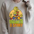 Summer Reading Teacher Unearth a Story Library Book Lover Raglan Sleeve Sweatshirt Heather Forest