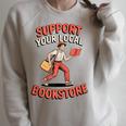 Support Your Local Bookstore Retro Book Lover Raglan Sleeve Sweatshirt Heather Forest