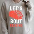 Lets Taco Bout Reading For Book Lover Reading Teacher For Men Women Kids Raglan Sleeve Sweatshirt Heather Forest