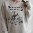Teach Children To Worship Satan Satanic Demon Devil Book Raglan Sleeve Sweatshirt Heather Forest