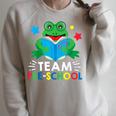 Team Pre-School Reading Frog Back To School Book Lover Raglan Sleeve Sweatshirt Heather Forest Team Pre-School Reading Frog Back To School Book Lover Raglan Sleeve Sweatshirt Heather Forest