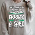 That's What I Do I Read Books I Eat Cakes Book Lover Raglan Sleeve Sweatshirt Heather Forest
