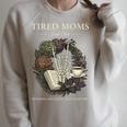 Tired Moms Book Club Dark Floral Coffee Skeleton Raglan Sleeve Sweatshirt Heather Forest Tired Moms Book Club Dark Floral Coffee Skeleton Raglan Sleeve Sweatshirt Heather Forest