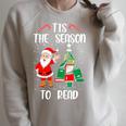 Tis The Season To Read Christmas Reindeer Book Reading Fan Raglan Sleeve Sweatshirt Heather Forest