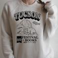 Tucson Festival Of Books TFOB 2023 Racoon Mascot Raglan Sleeve Sweatshirt Heather Forest