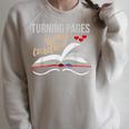 Turning Pages Is My Cardio Reading Book Novelty Shirt Raglan Sleeve Sweatshirt Heather Forest