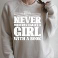 Never Underestimate a Girl With a Book Aesthetic Graphic Raglan Sleeve Sweatshirt Heather Forest Never Underestimate a Girl With a Book Aesthetic Graphic Raglan Sleeve Sweatshirt Heather Forest