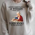 Never Underestimate A Woman Who Still Reads Books In Her Raglan Sleeve Sweatshirt Heather Forest